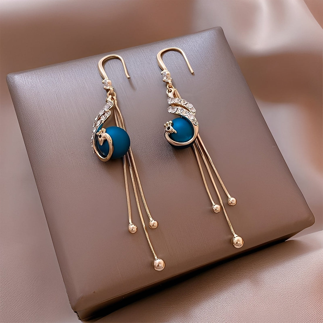Sheynn – Festive Earrings with Blue Pearls
