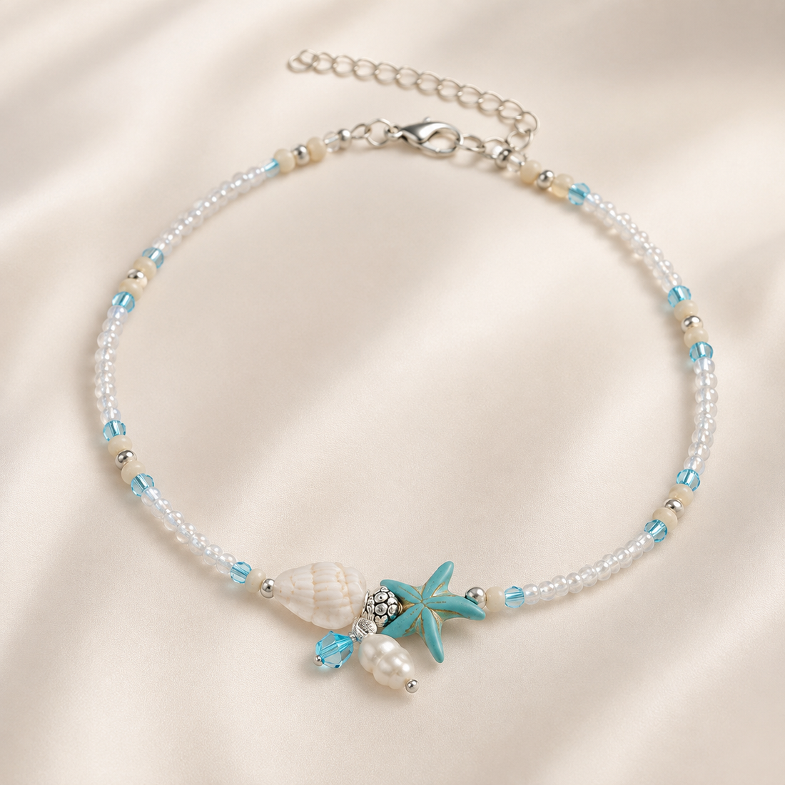 Mireva – Ankle bracelet with star, shell, and natural stones