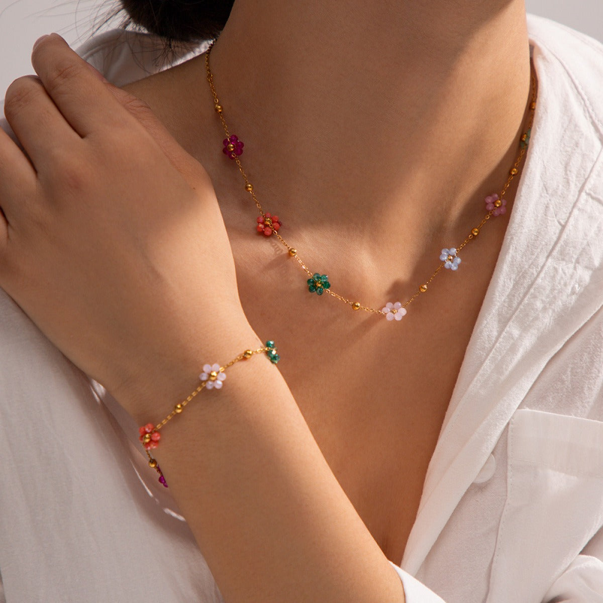 Karylle – Gold necklace with small colored flowers