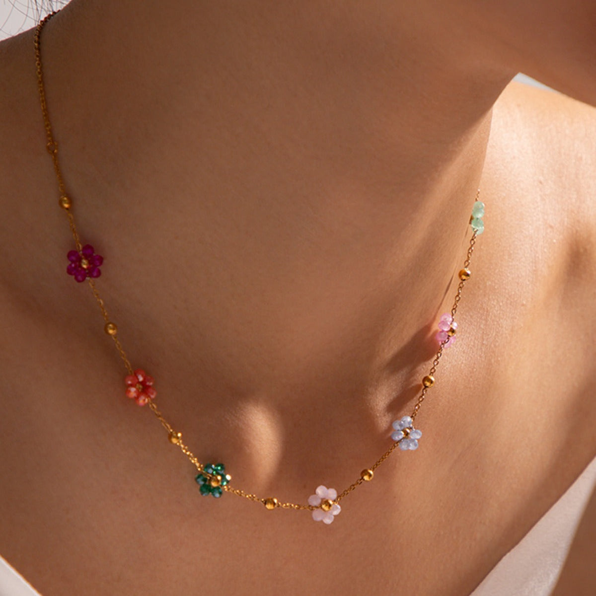 Karylle – Gold necklace with small colored flowers